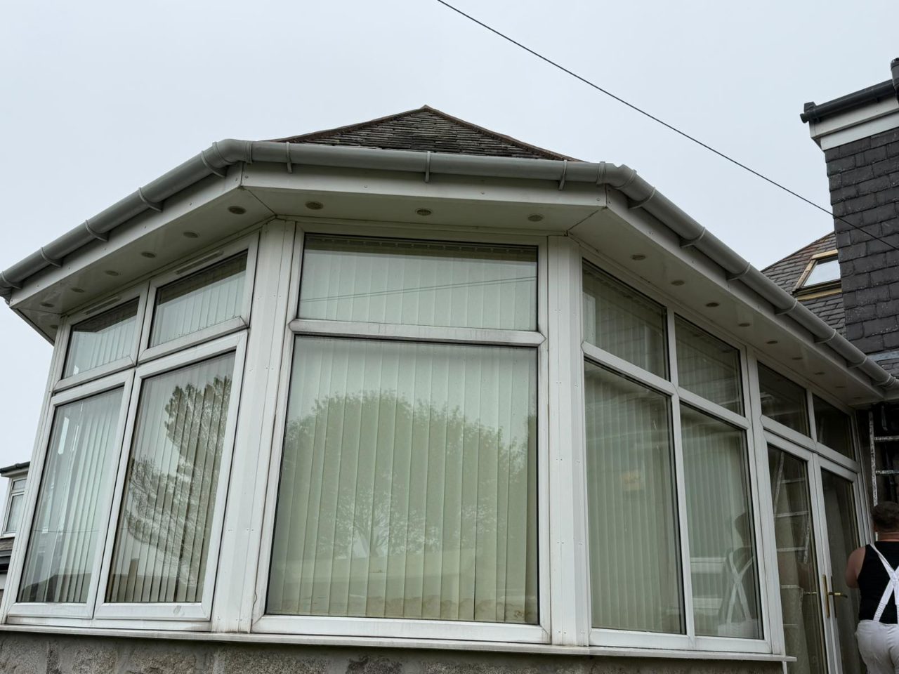 White PVC fascia, soffit and guttering above a bay window