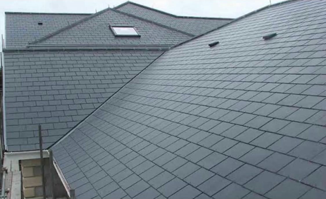 Completed slate roof with Velux windows