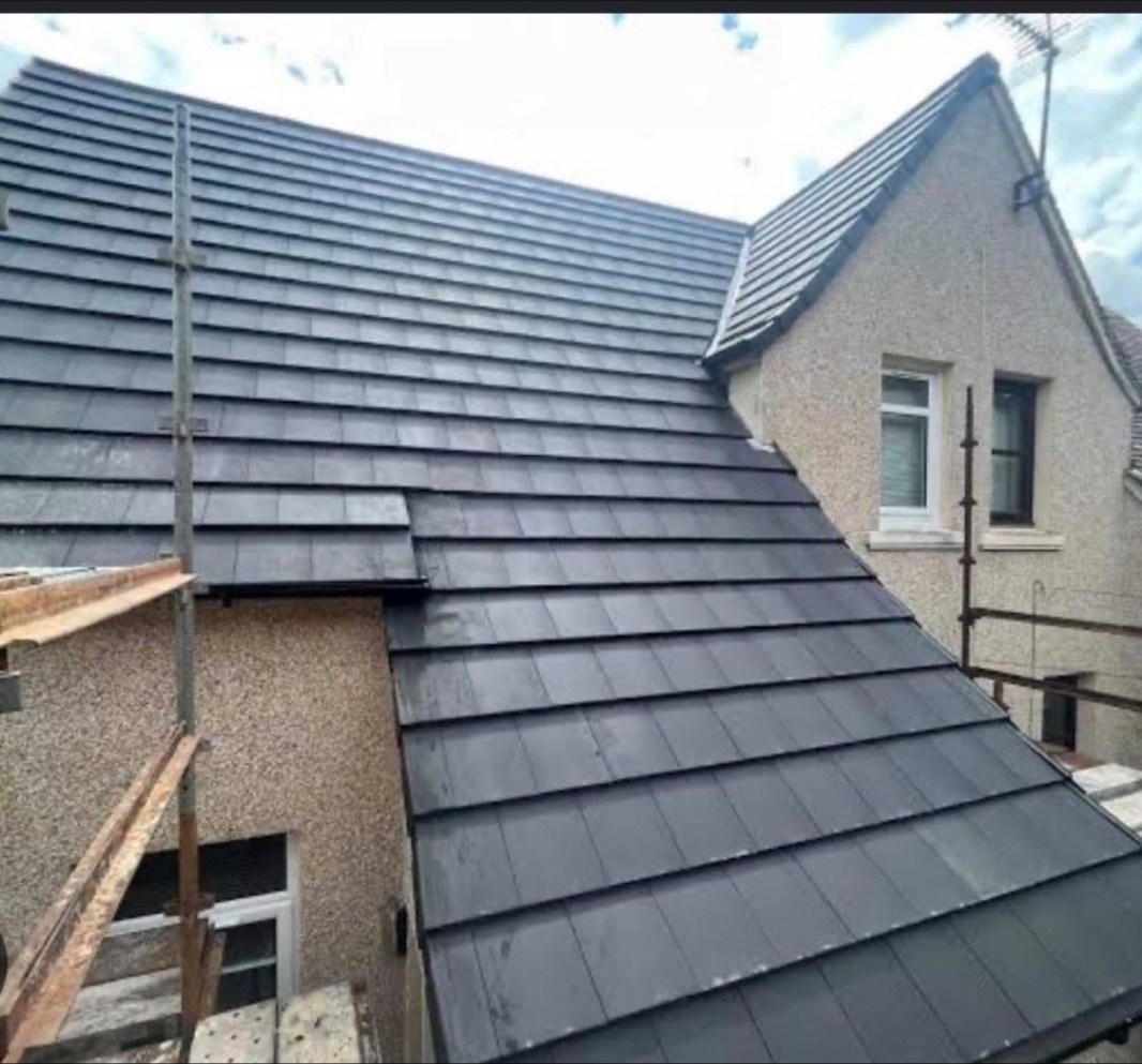 New slate roof with scaffold