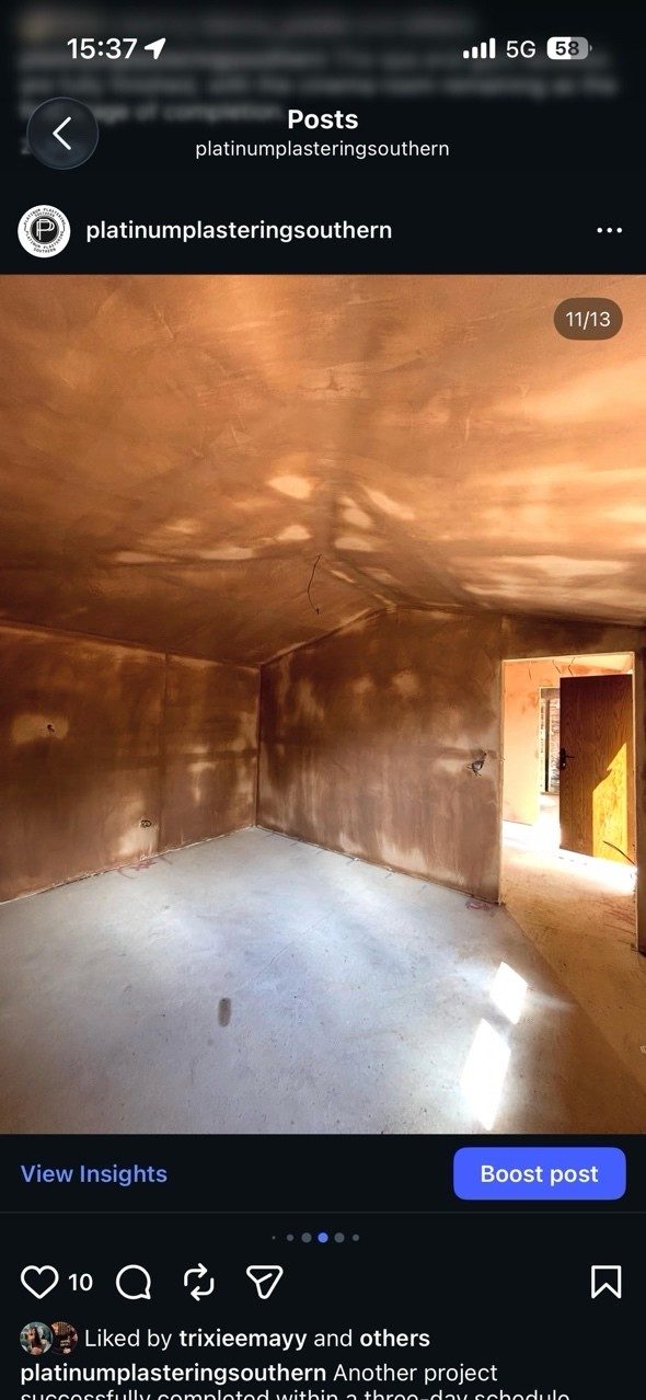 Room freshly plastered in pink finish plaster