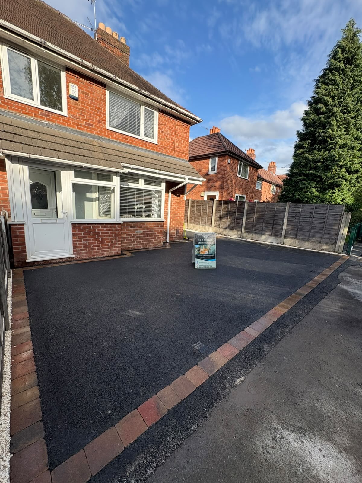 Tegula Heather block edging with 55 sqm tarmac and ACO drains