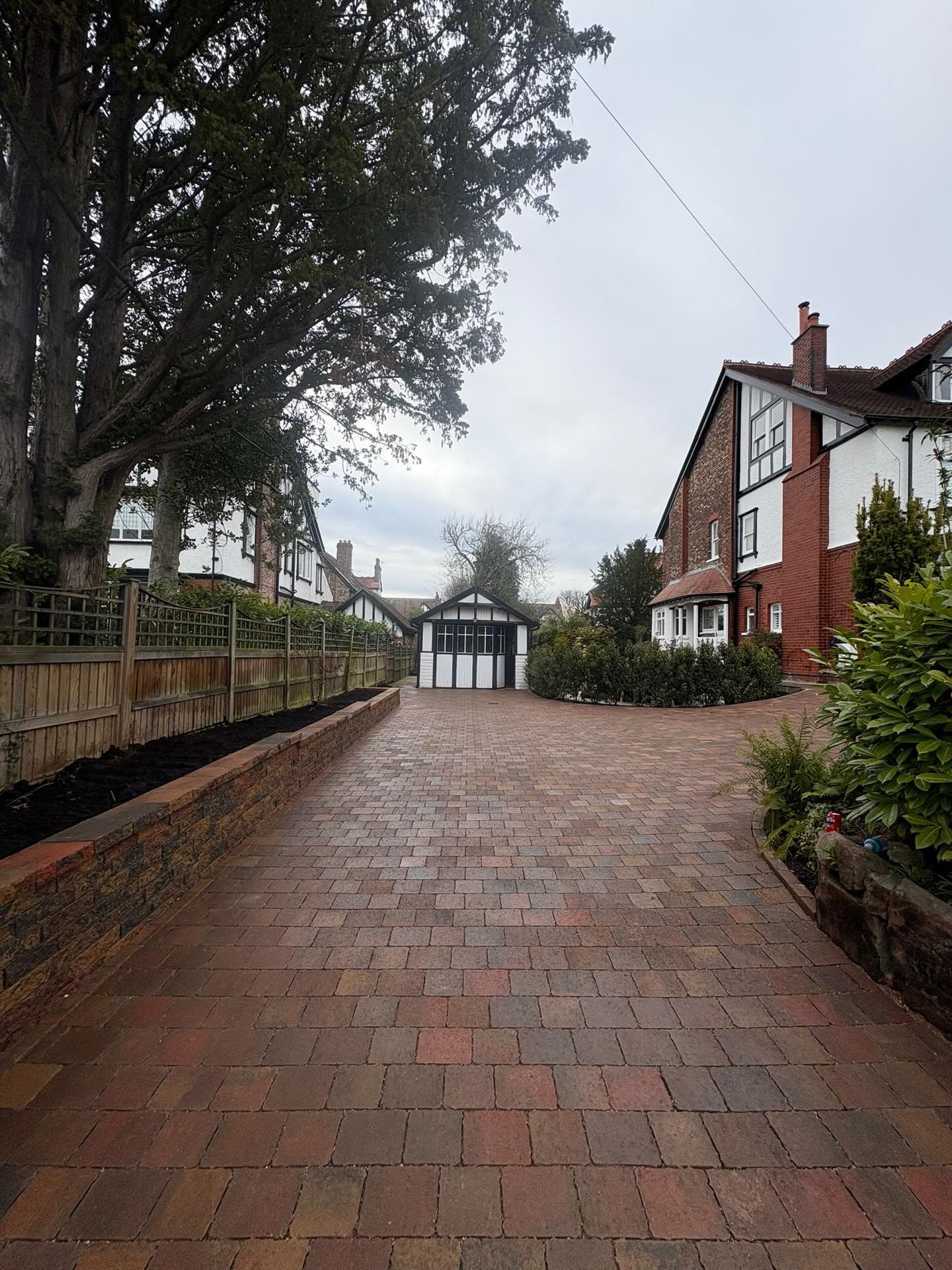 Indian sandstone, 3 retaining walls, 155 sqm permeable paving in Heather Duo