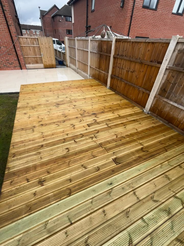 Hardwood decking with 38 sqm cream porcelain patio