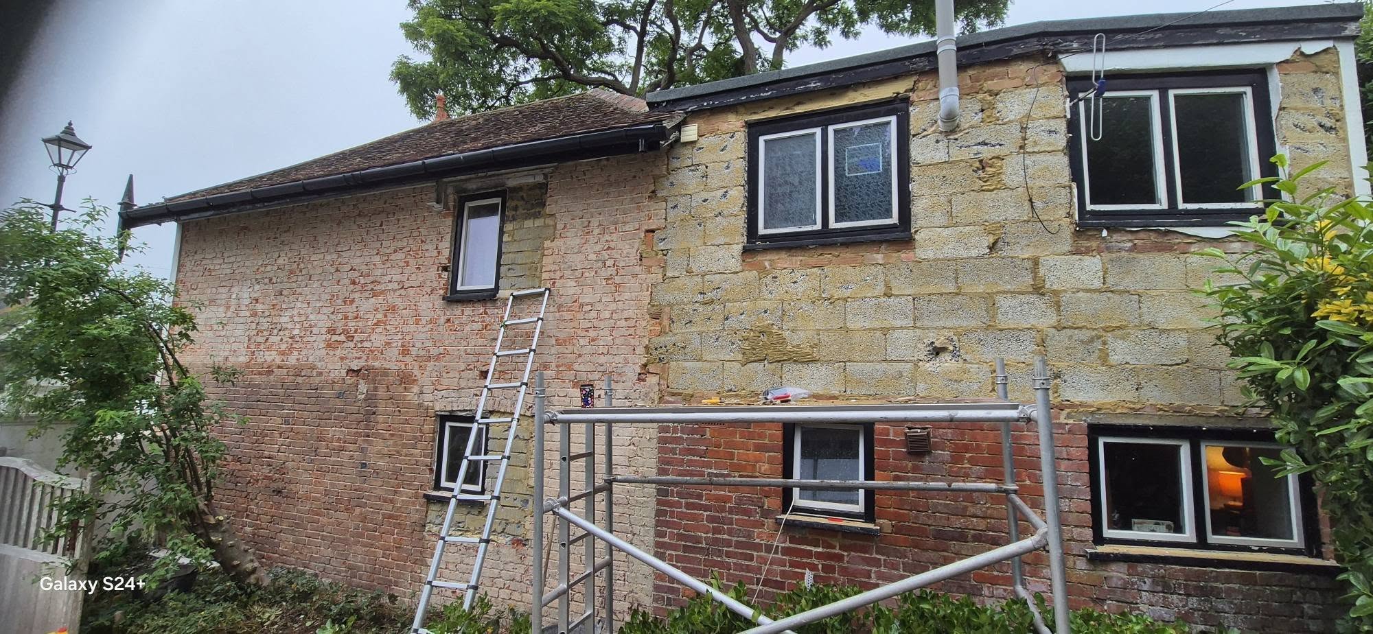 Render being applied to the house during the job