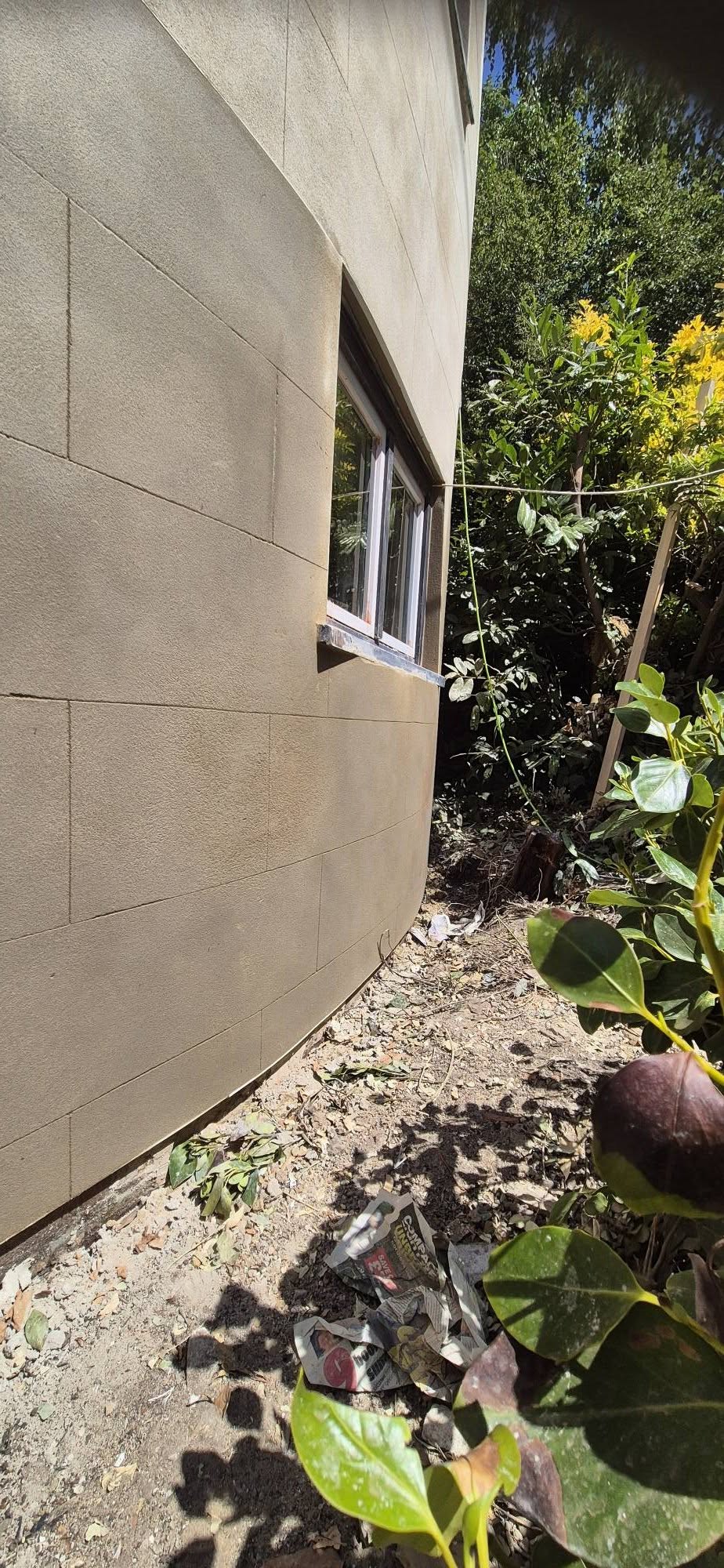 Finished curved bay rendered in cream silicone render