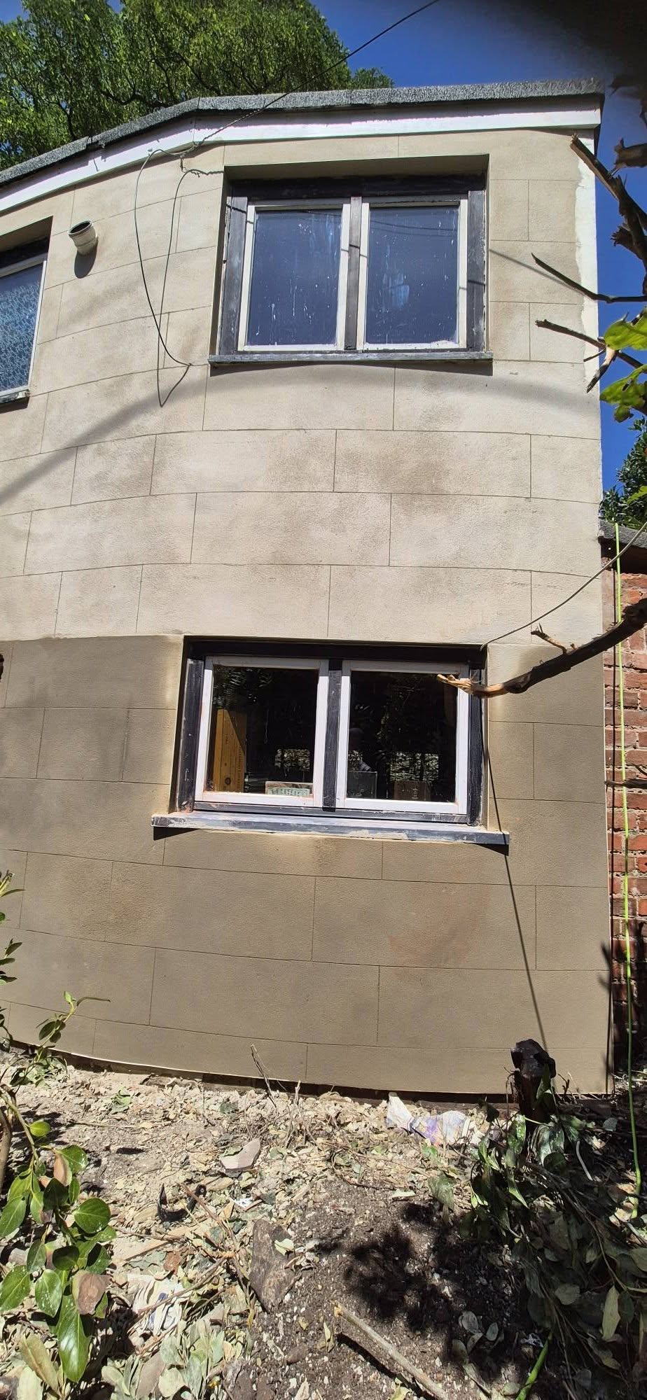 Close detail of the completed ashlar render lines