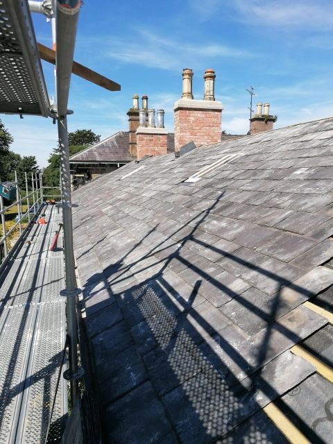 Reclaimed slate on a listed building