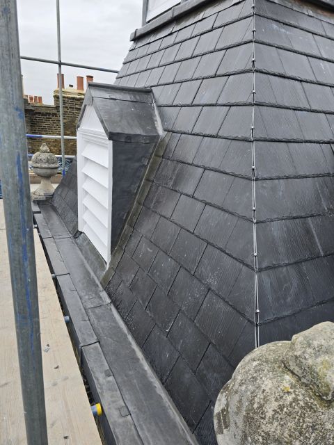Slate dormer with lead flashing detail