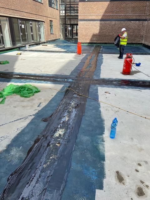 Hot melt waterproofing in progress