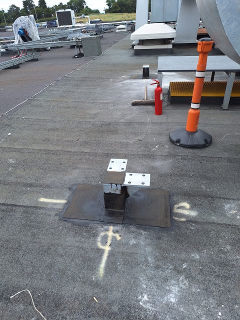Steel penetrations sealed, flat roof
