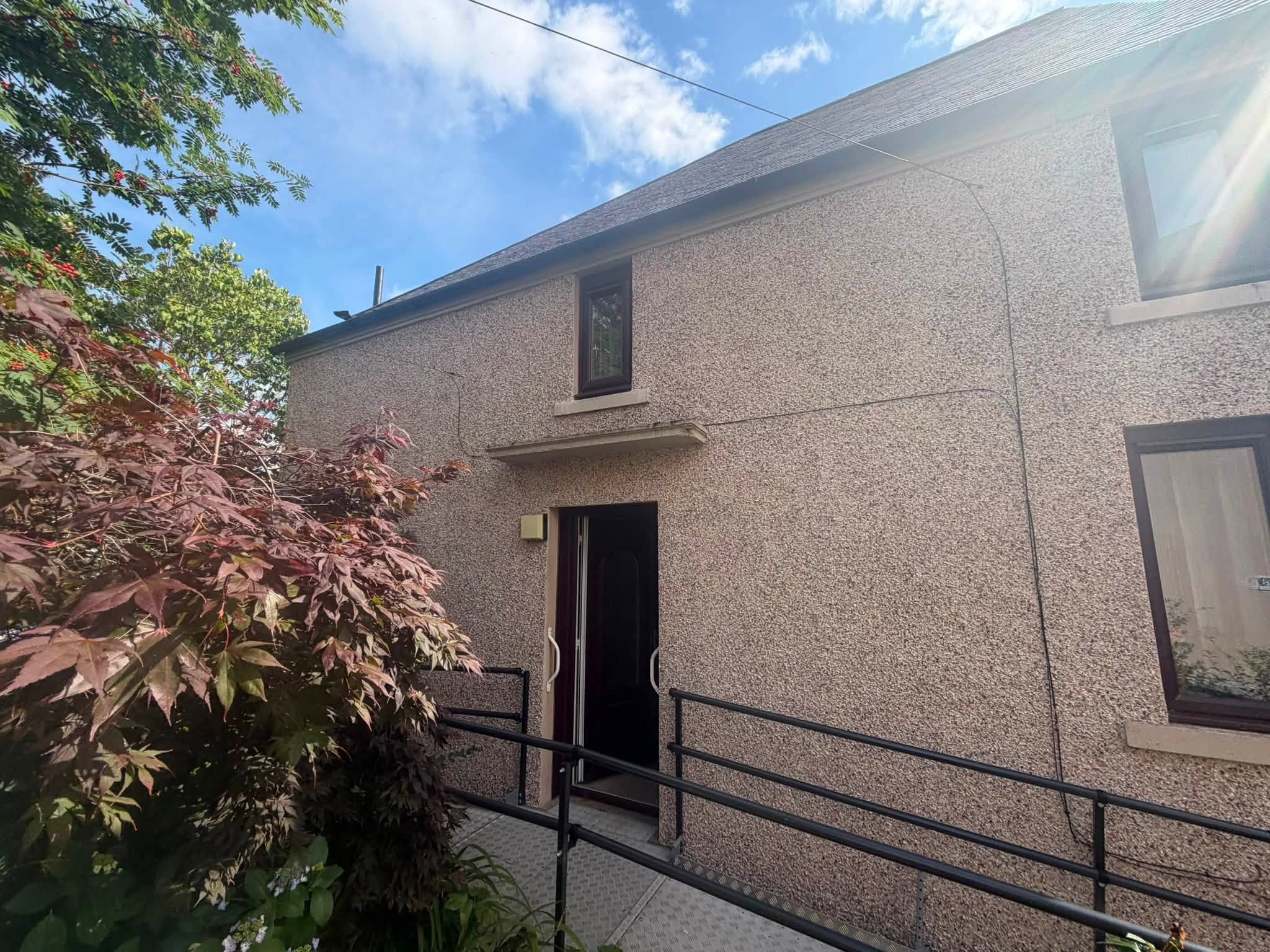 Side elevation of a house with finished roofline
