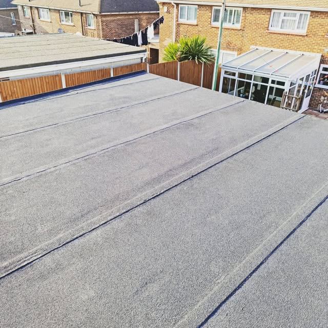 Large finished felt flat roof over a rear extension