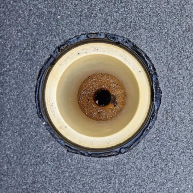 Close-up of a bonded rainwater outlet in felt