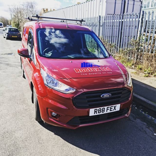 The branded red Roofex Ltd van