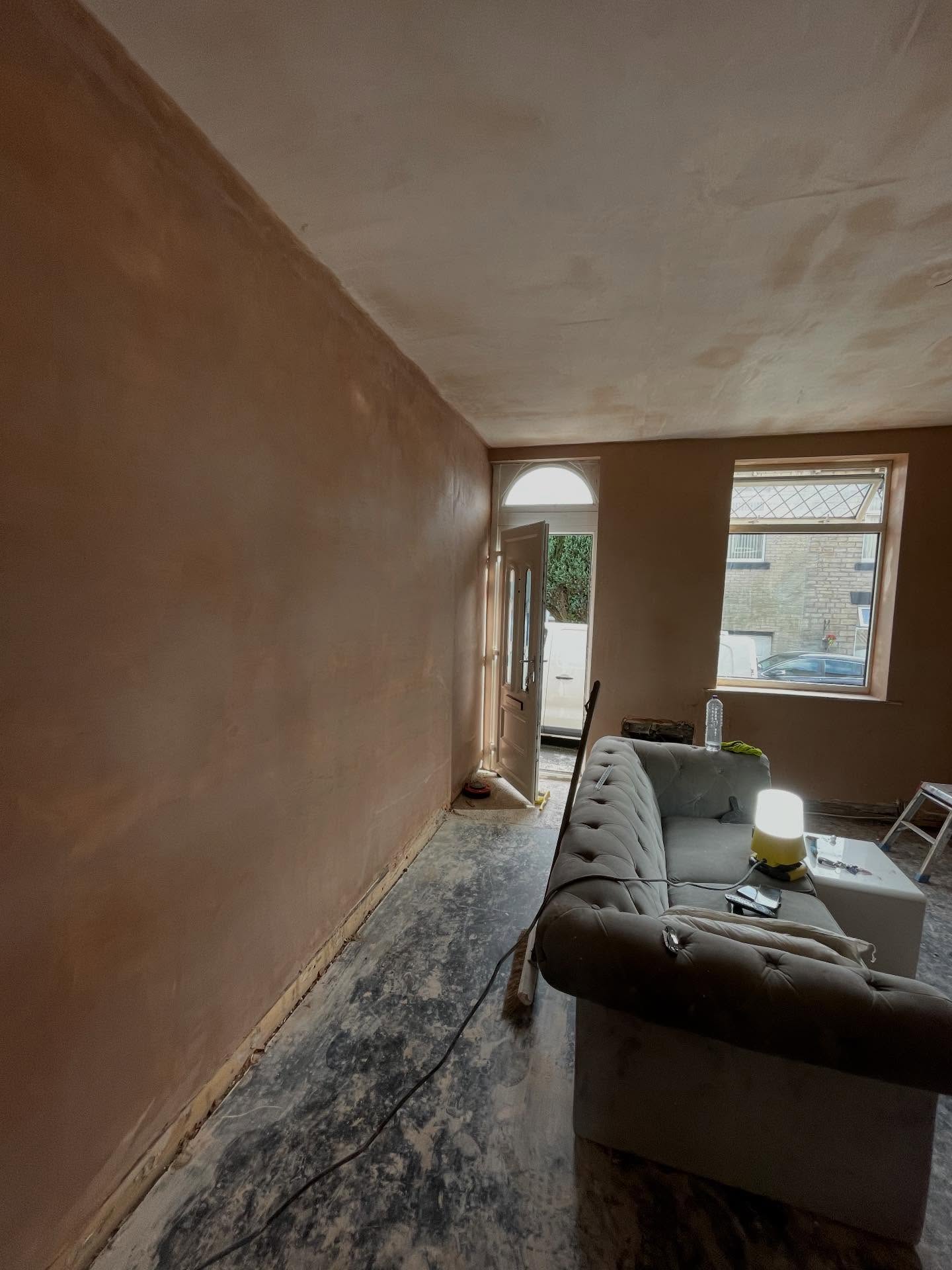 Freshly skimmed through-lounge by Silko Plastering Solutions