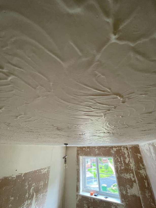 Before: Artex ceiling skimmed to a smooth finish