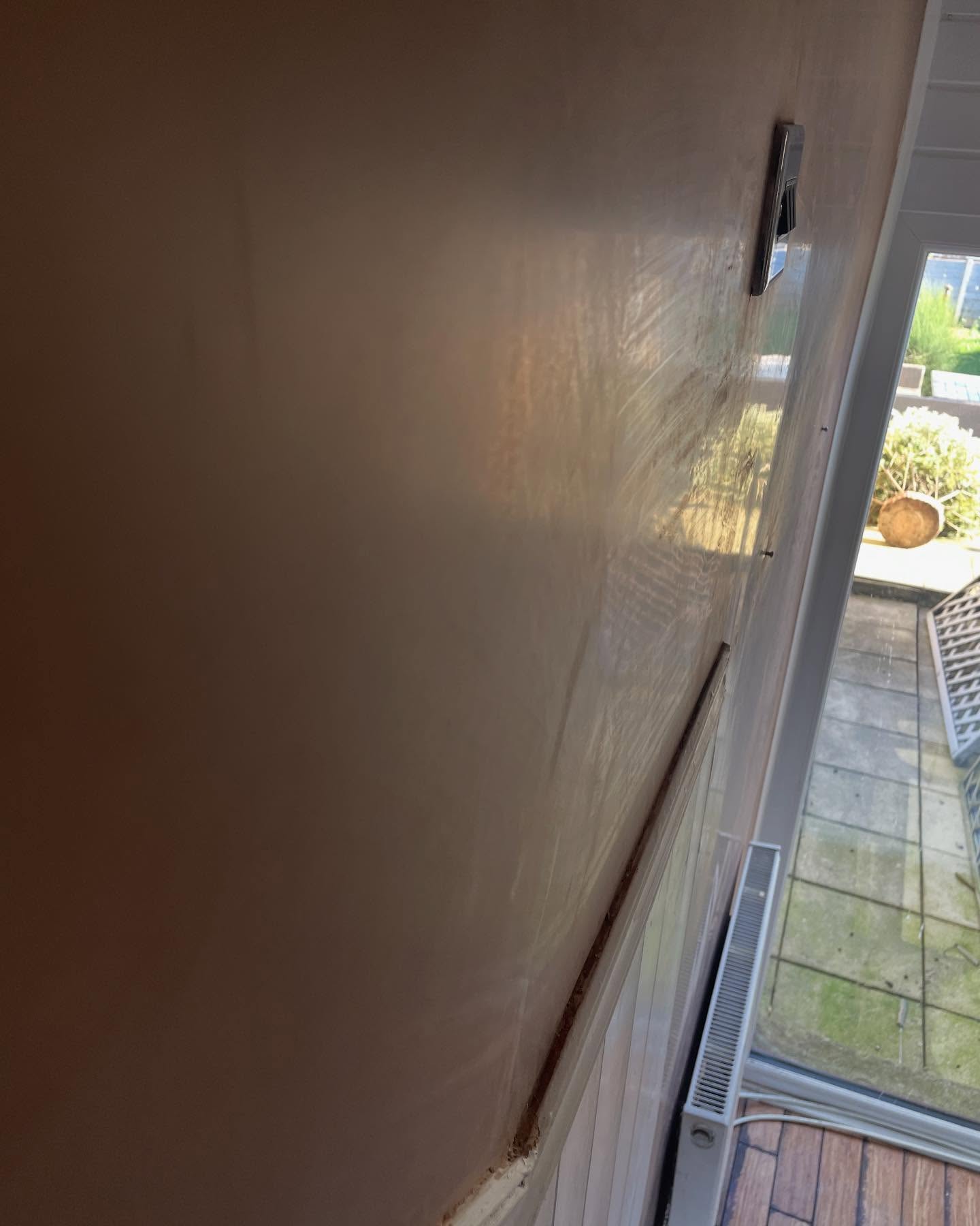 Freshly skimmed smooth wall ready for decorating